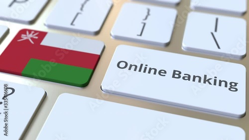 Online Banking text and flag of Oman on the keyboard. Internet finance related conceptual 3D animation photo