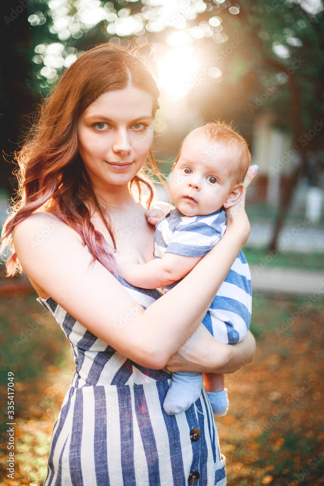 Mother and her child enjoy the early spring Mother and her child enjoy the early spring
