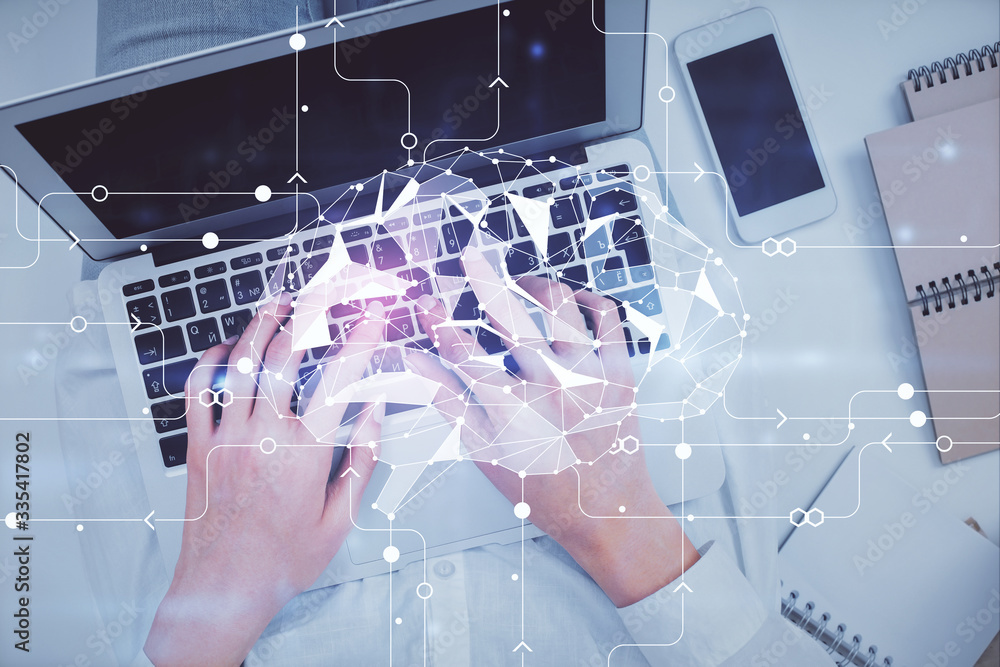 Double exposure of woman working on computer andhuman brain hologram drawing. Top View. Ai concept. Double exposure of woman working on computer andhuman brain hologram drawing. Top View. Ai concept.