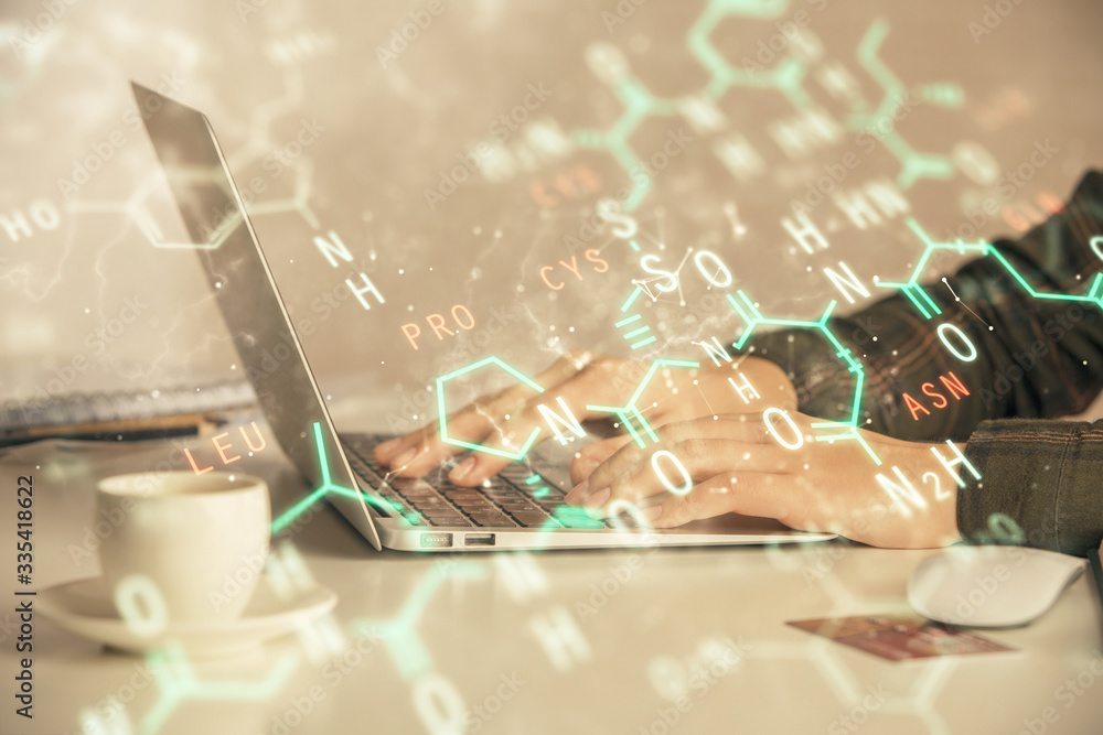Fototapeta premium Double exposure of woman hands typing on computer and formula hologram drawing. Education concept.