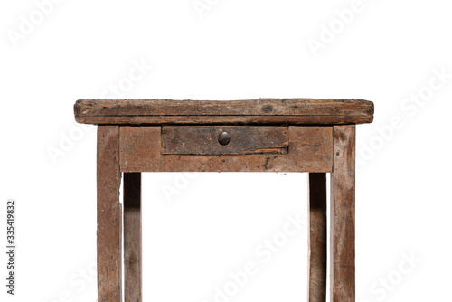 Front side of old rectangular old vintage brown work desk wooden table with one drawer in the middle