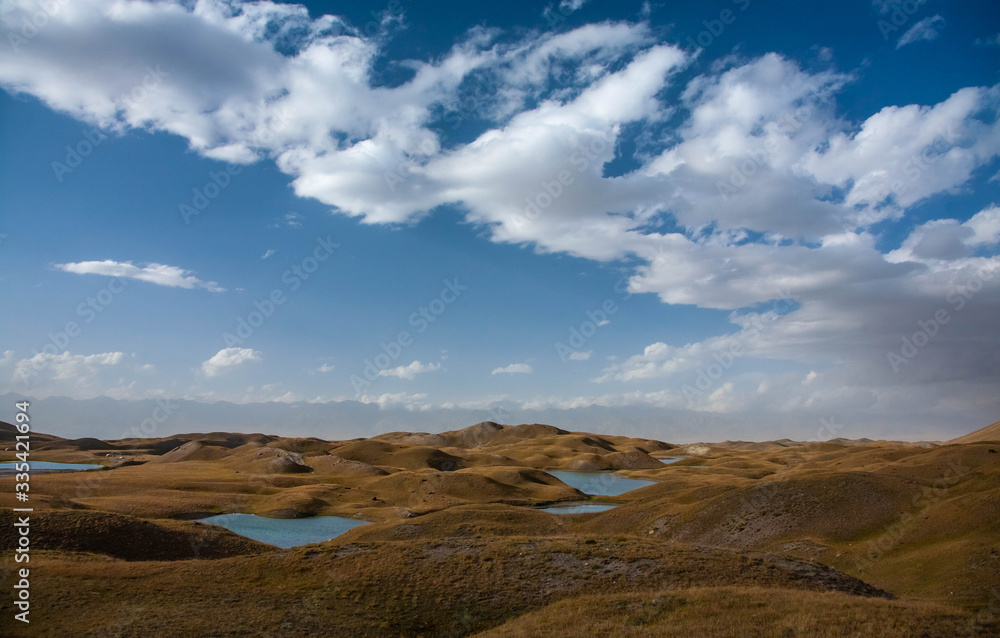 Beautiful landscape. Scenic lakes between mountains. Kyrgyz nature. Beautiful landscape. Scenic lakes between mountains. Kyrgyz nature.