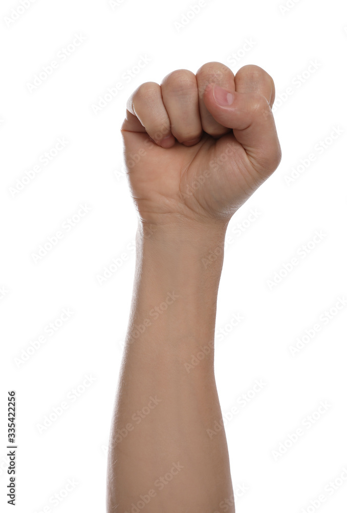 Man with raised fist against white background, closeup of hand Man with raised fist against white background, closeup of hand
