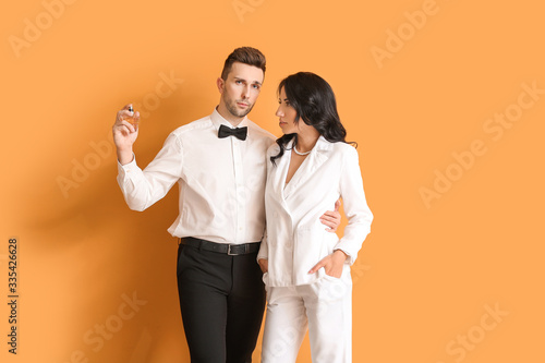 Stylish young couple with p...