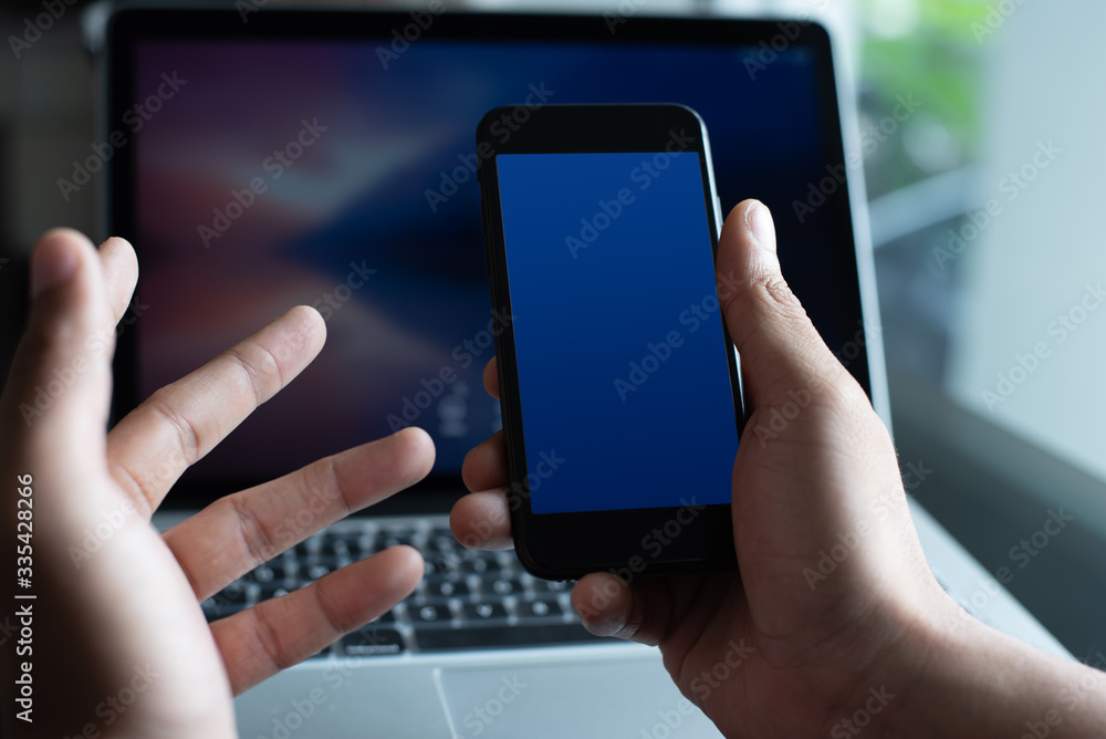 Mockup smart phone at office Mockup smart phone at office