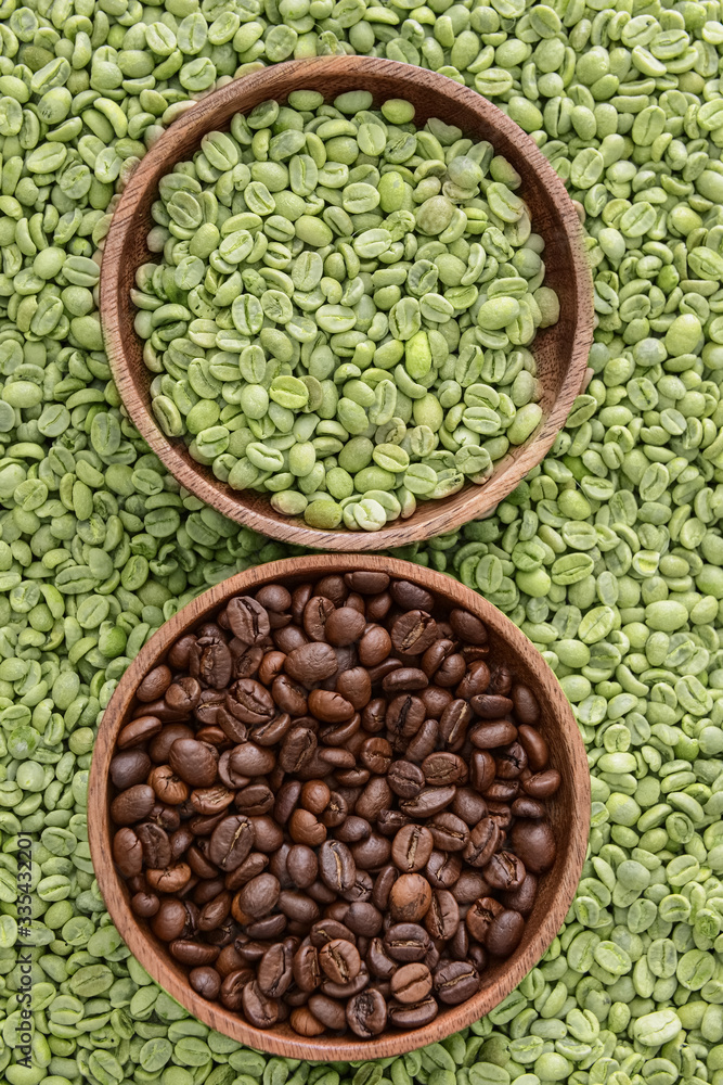 Fototapeta premium Plates with roasted and green coffee beans