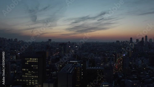 Wallpaper Mural TOKYO, JAPAN - MAY 2020 : Aerial high angle sunrise scenery of CITYSCAPE of TOKYO around Shinjuku and Ikebukuro city. Long time lapse shot night to morning. Japanese urban metropolis concept. Torontodigital.ca