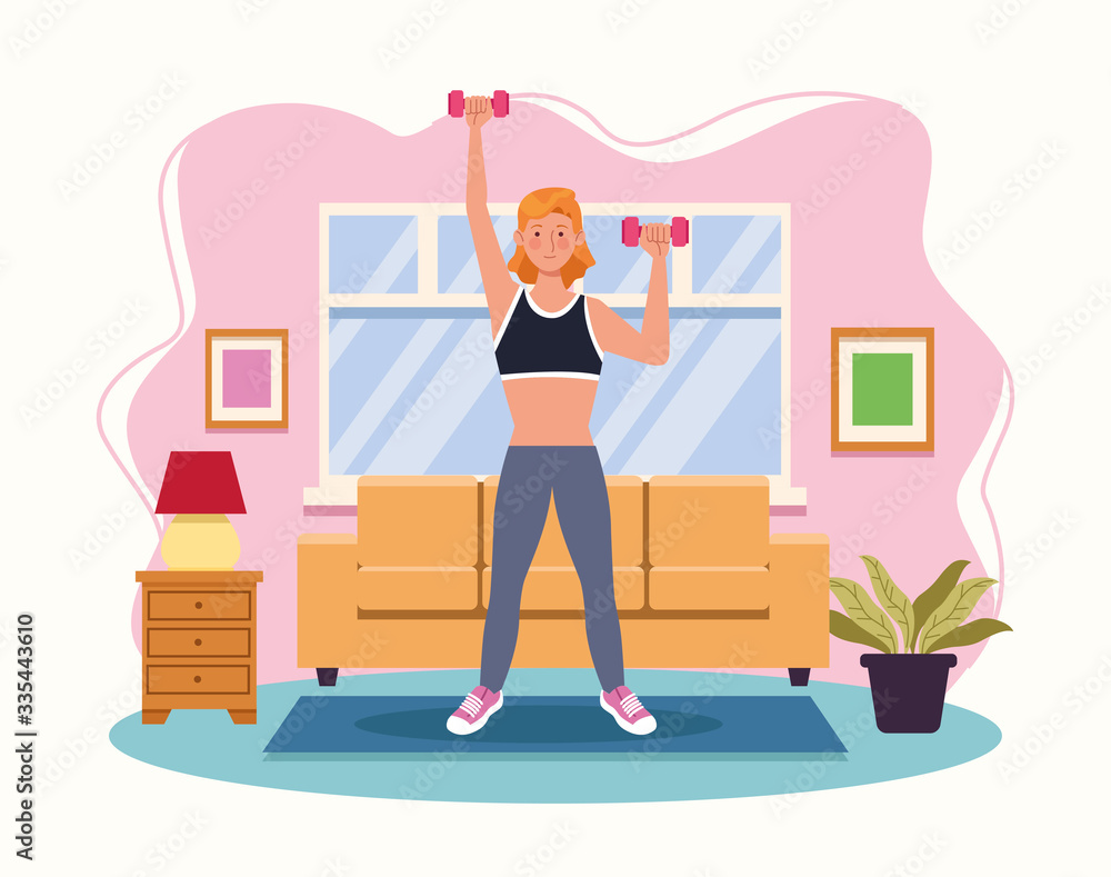 woman lifting dumbbells in the house