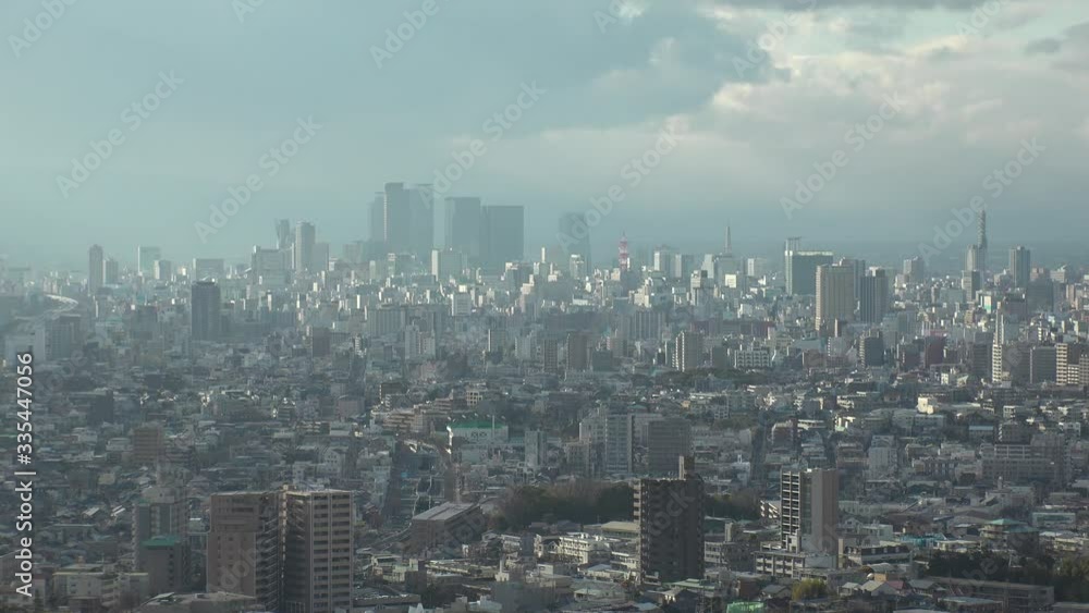 NAGOYA, AICHI, JAPAN - FEB 2020 : Aerial high angle view of cityscape of Nagoya city. View of buildings and street traffic around central downtown area. Time lapse shot in day time. NAGOYA, AICHI, JAPAN - FEB 2020 : Aerial high angle view of cityscape of Nagoya city. View of buildings and street traffic around central downtown area. Time lapse shot in day time.
