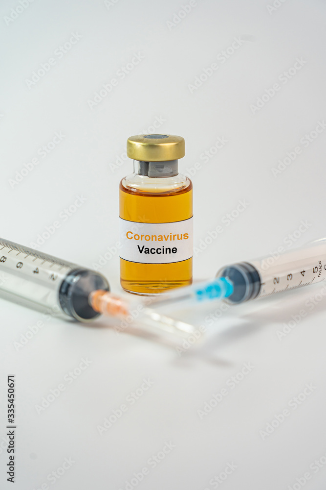 Coronavirus vaccine concept with medical syringe injection on white background Coronavirus vaccine concept with medical syringe injection on white background