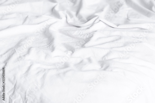 crumpled white sheets