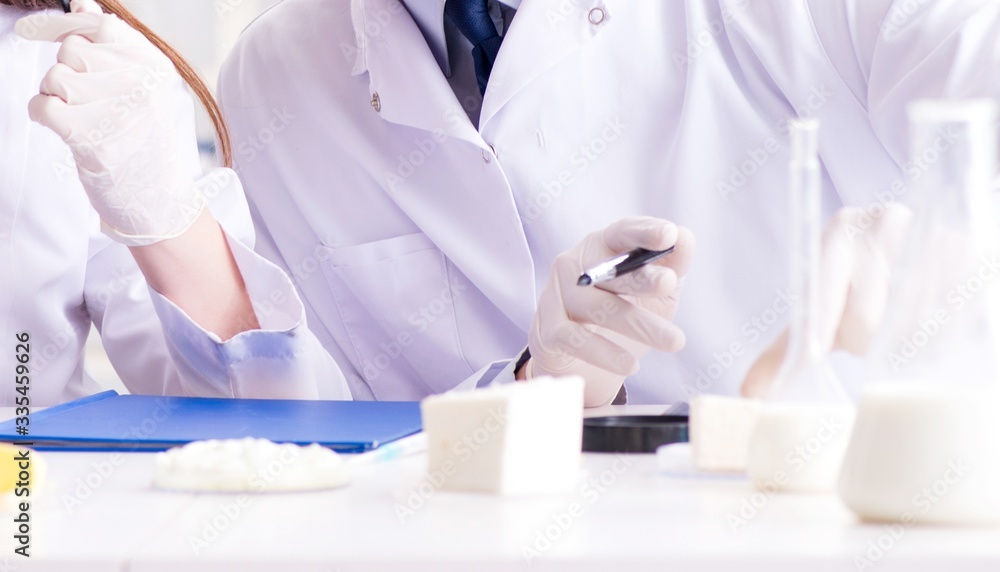 Two lab doctor testing food products Two lab doctor testing food products