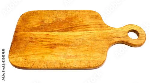 A wooden cutting board isolated on a white background.