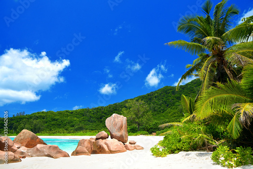 Anse Cocos beach in La Digue Island, Seychelles. Tropical landscape with sunny sky.