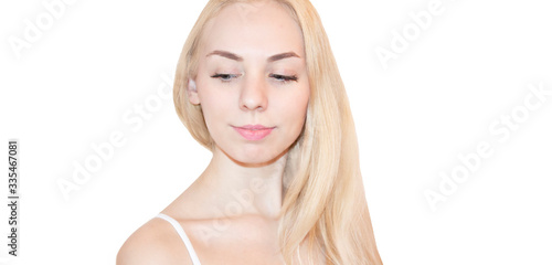 Front view of pensive blondy young woman looking down isolated on white.Dreamy girl.Serene portrait.panoramic shot.