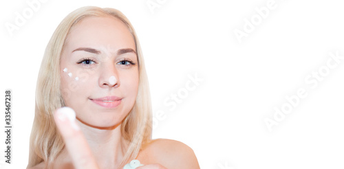 Happy beautiful girl with clean perfect skin. Youth and Skin Care Concept.Close up, selective focus, copyspace.
