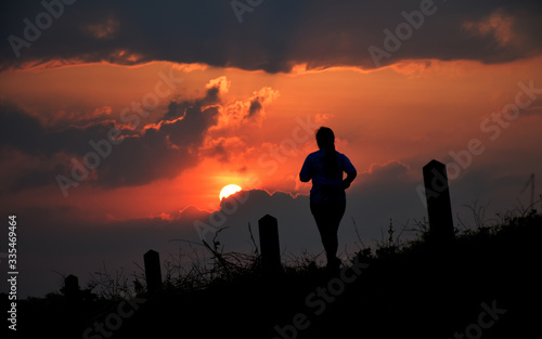 girl with shadow run in the morning