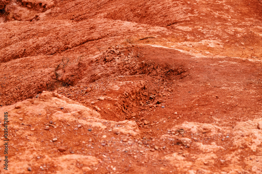 Fototapeta premium Macro closeup of red earth on a mountain