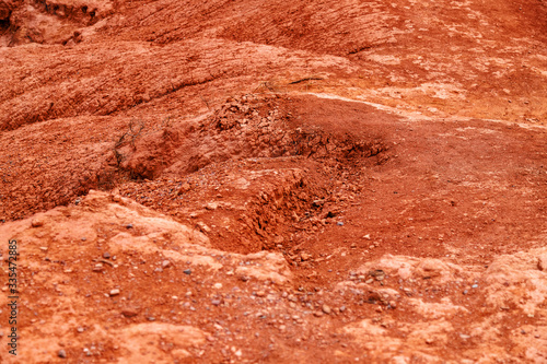 Macro closeup of red earth on a mountain