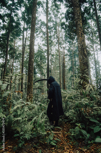 mysterious person in the middle of the forest. Halloween 