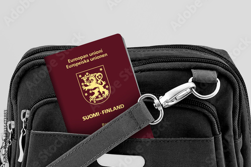 Close up of Finland Passport in Black Travel Bag Pocket