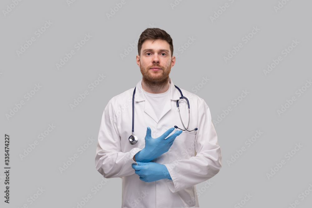 Doctor Puts on Gloves. Medical Concept Corona Virus Doctor Puts on Gloves. Medical Concept Corona Virus