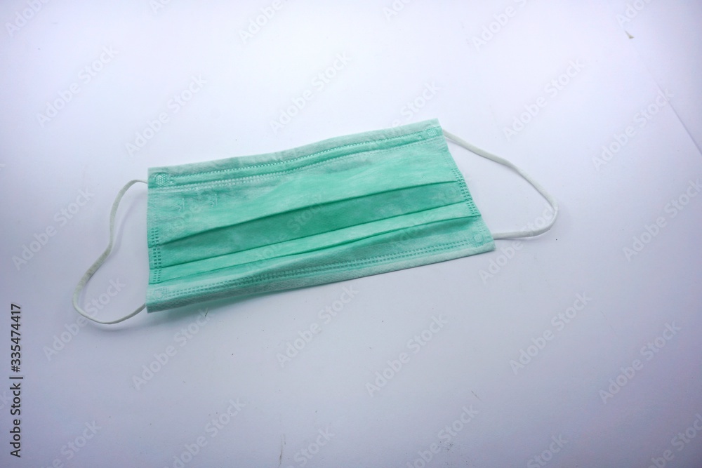 green mask to cover mouth and nose so that dirty air does not enter the body green mask to cover mouth and nose so that dirty air does not enter the body