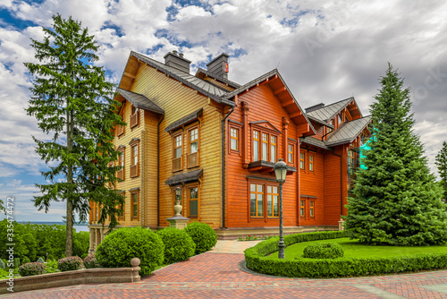 Big house in beautiful green park Mizhhirya. Former residence of Yanukovich, ex-president of Ukraine. Mezhyhiria. photo