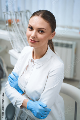 Cheerful young doctor in clinic stock photo Free Download Cheerful young doctor in clinic stock photo - GFXLoad
