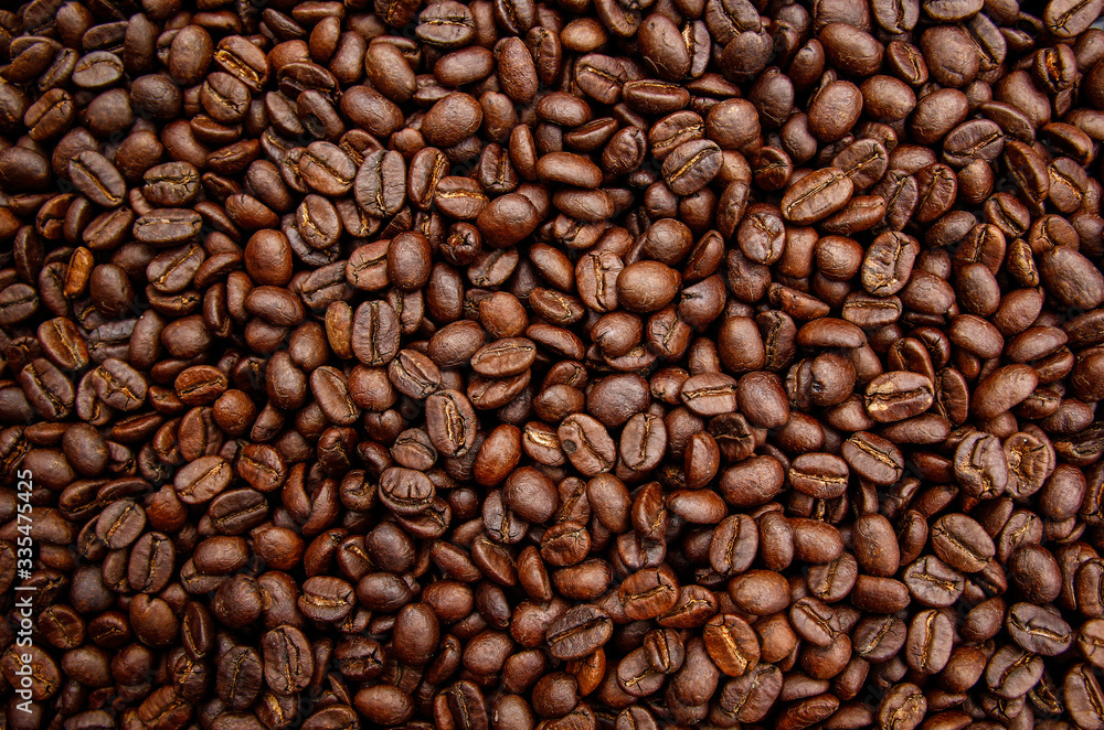 Fototapeta premium roasted coffee bean texture background.