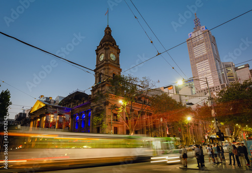 Melbourne architecture at night with city traffic