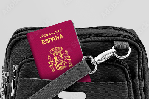 Close up of Spain Passport in Black Travel Bag Pocket