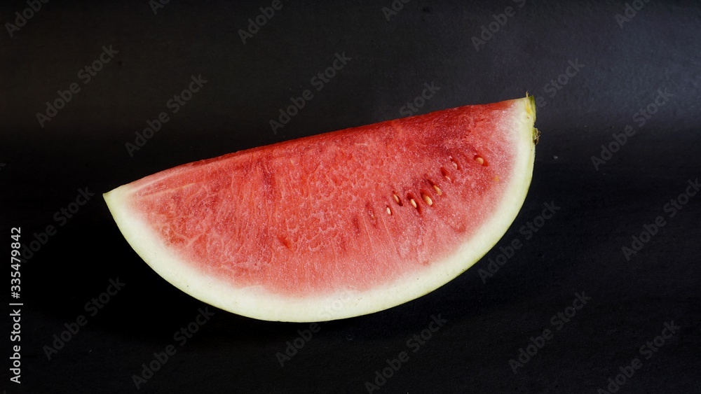 Fresh red watermelon slices. Efficacious watermelon to prevent asthma, lower blood pressure, ward off dangerous cancer cells, smooth digestion, prevent inflammation, and a natural source of collagen.