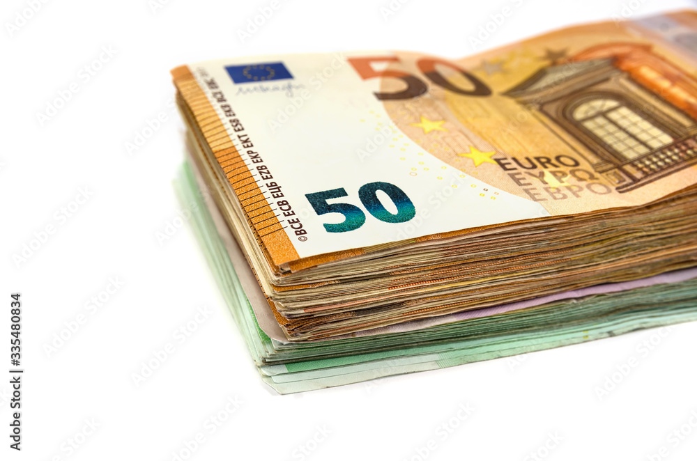 stack of euro banknotes on a white background. stack of euro banknotes on a white background.