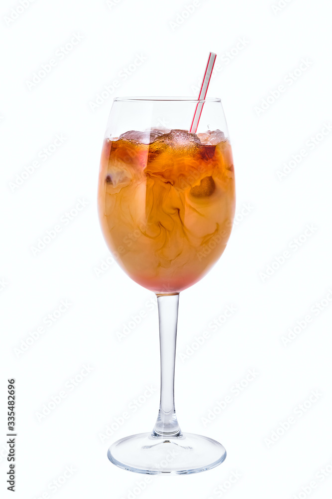 Cold brew coffee in a wine glass isolated on white Cold brew coffee in a wine glass isolated on white