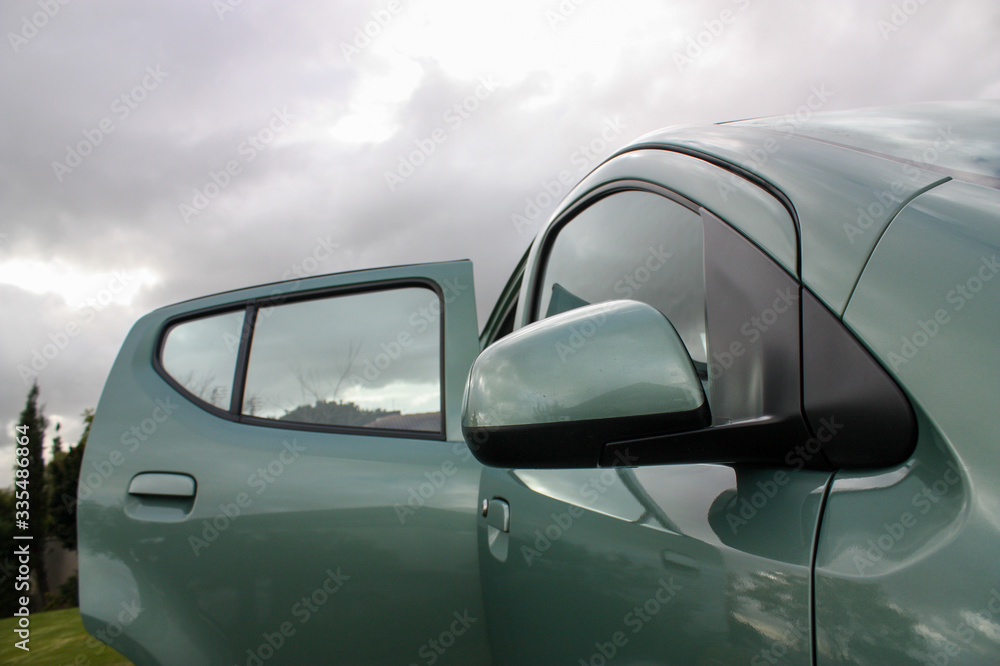 Naklejka premium Budget car with rear door open