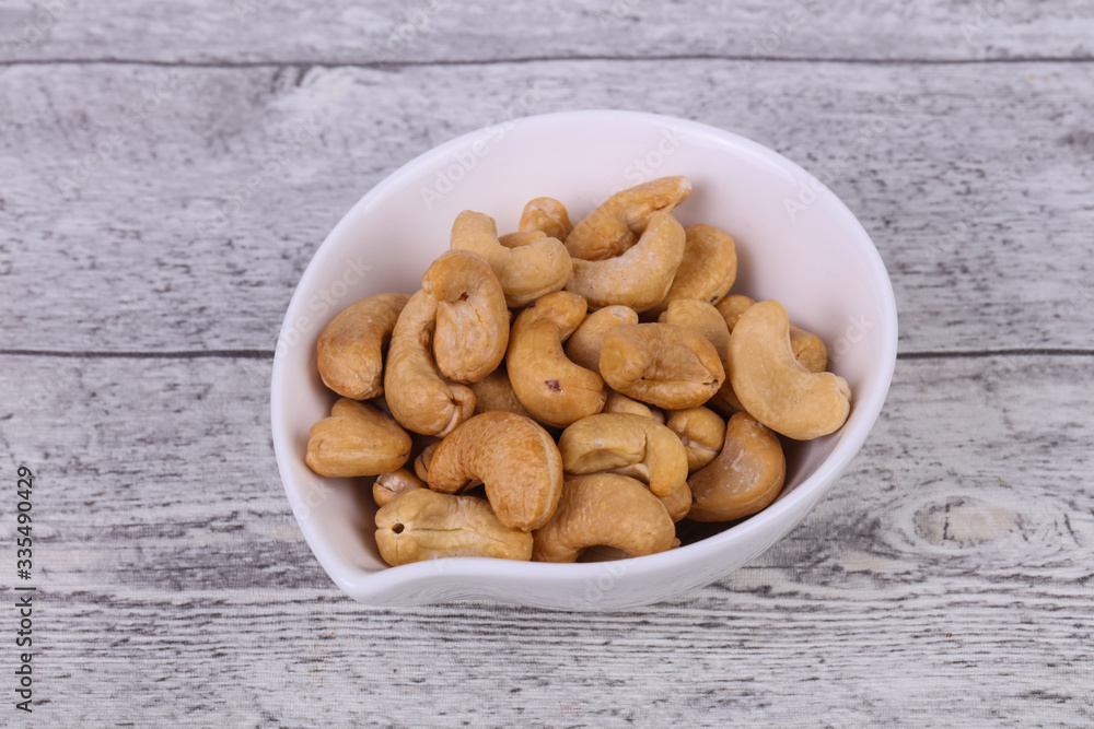 Cashew nuts heap in the bowl Cashew nuts heap in the bowl