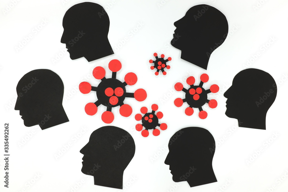 Group of human male profile silhouette and coronavirus cutout in white background. Depression and mental health issue during covid-19 health crisis.