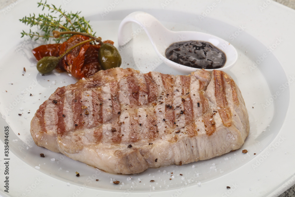 Grilled pork steak with pepper sauce Grilled pork steak with pepper sauce