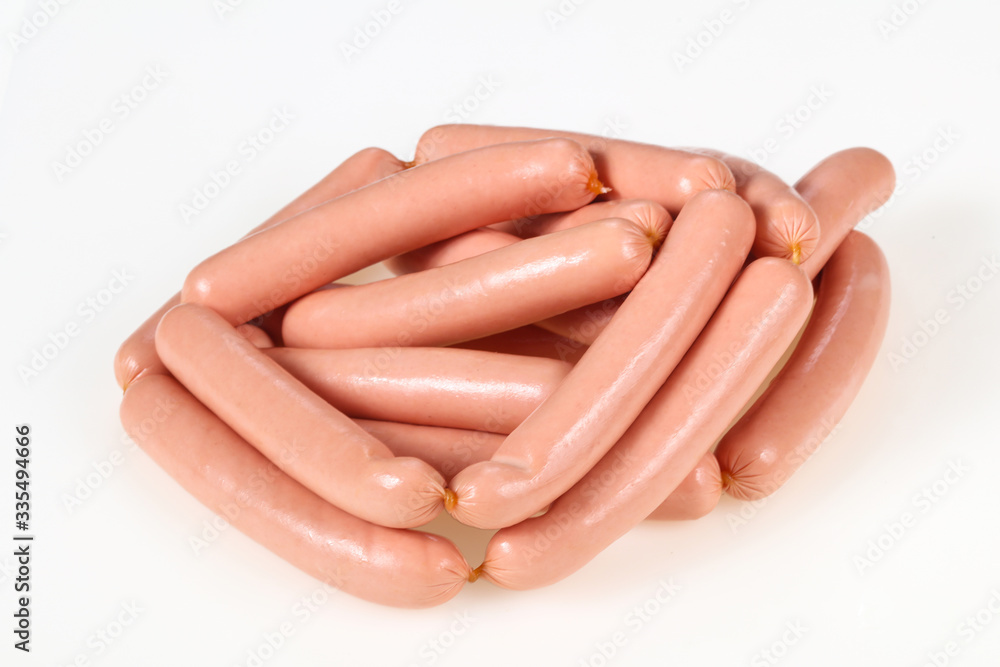 Tasty meat sausages over white background Tasty meat sausages over white background