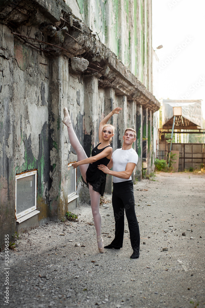 girl and guy dancers perform a passionate dance together outdoors in nature girl and guy dancers perform a passionate dance together outdoors in nature