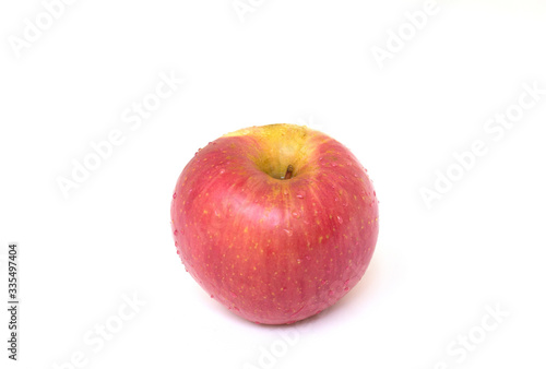 Fresh and organic Fuji Apple isolated on white background
