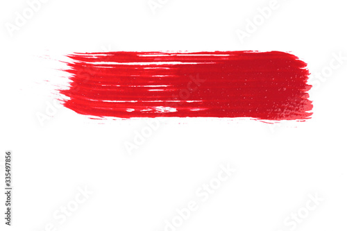 red brush stroke on white background