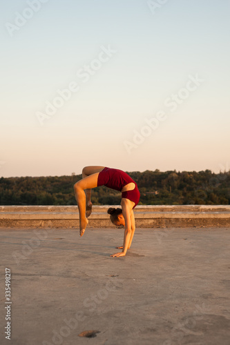 girl dancer while dancing in the summer outdoors