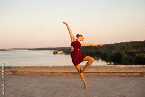 girl dancer while dancing in the summer outdoors