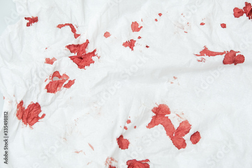 blood stains on a white paper