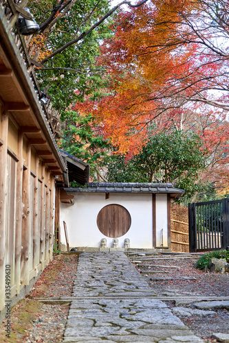 Old stone path to the building with circle window