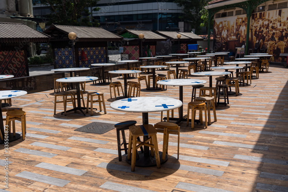 Marked stalls for social distancing at Hawker center, Singapore