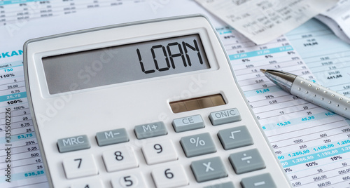 A calculator with the word Loan on the display