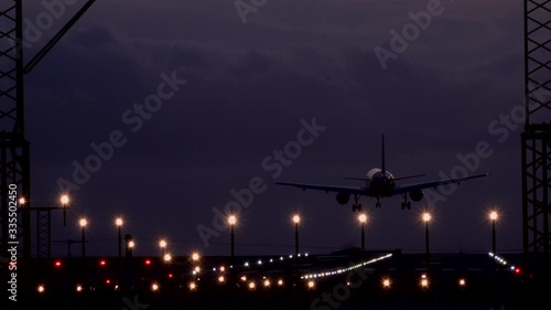 Manchester airport passenger jet landing in evening UK 4K photo